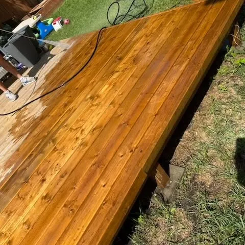 Freshly stained cedar deck in Winnipeg with a warm finish