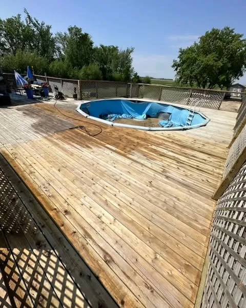 Large wood pool deck in Winnipeg after pressure washing