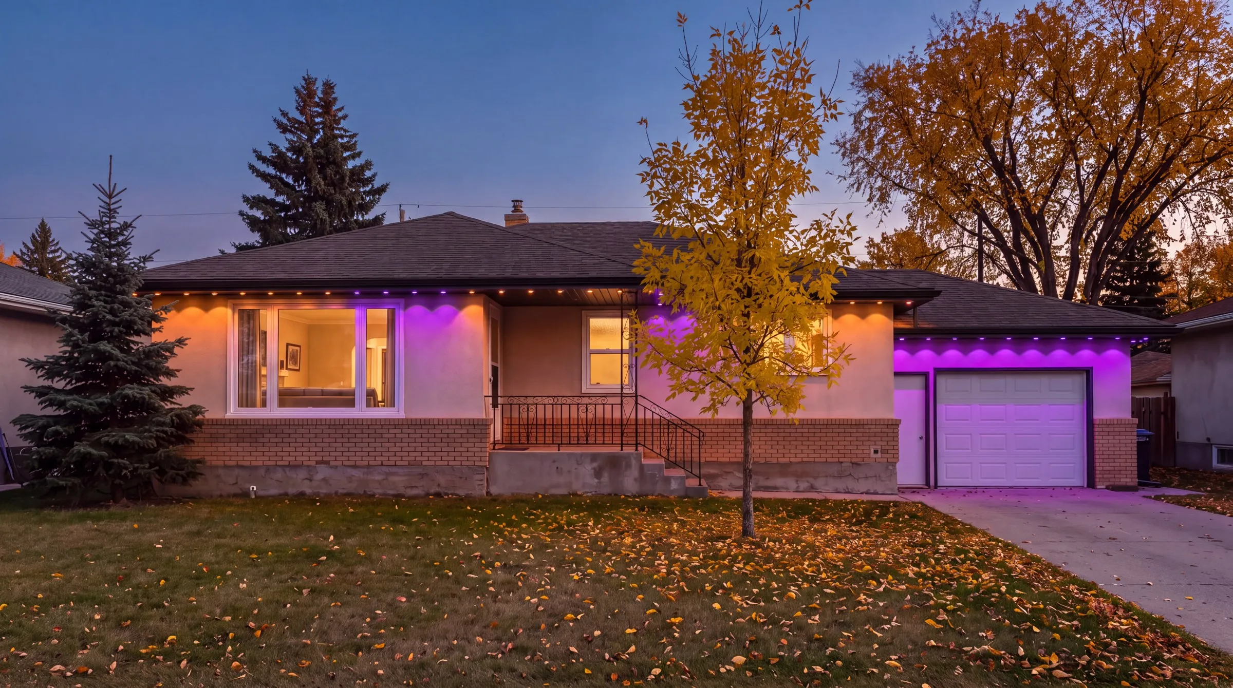 Winnipeg bungalow in October with Govee permanent lights in orange and purple for Halloween