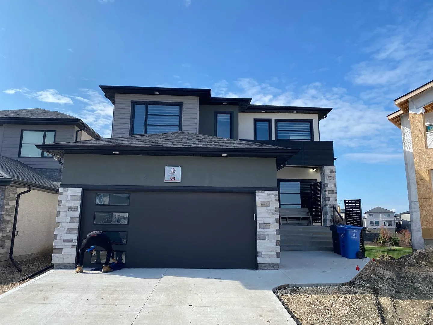 New two-storey Winnipeg home with clear windows after cleaning